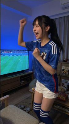 AI-generated image of Kanna Hashimoto in a Japan soccer jersey celebrating