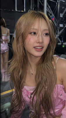 AI-generated selfie of a young woman backstage at a concert venue