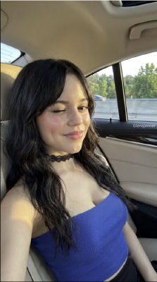 AI-generated image resembling Jenna Ortega taking a car selfie