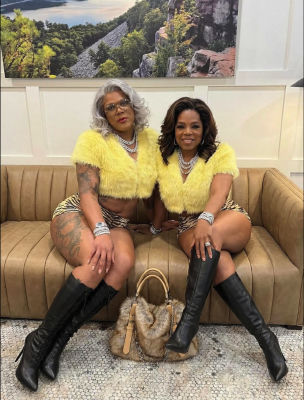 AI-generated image of Oprah Winfrey and Tyler Perry posing on a couch