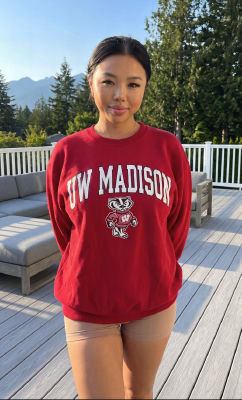 AI-generated image of a woman wearing a UW Madison sweatshirt