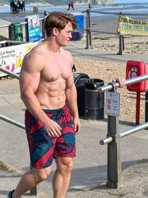AI-generated image of Kit Connor at a beach boardwalk