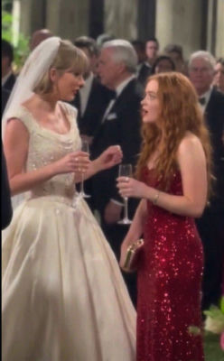 AI-generated image of Taylor Swift in a wedding dress with another woman at a formal event