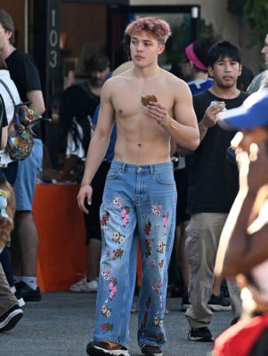 AI-generated image of Knox Léon Jolie-Pitt shirtless outdoors