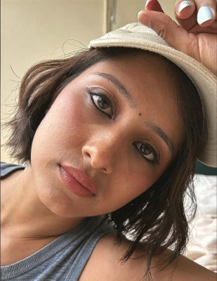 AI-generated selfie of an unidentified young woman