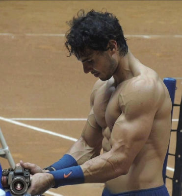 AI-generated image of Rafael Nadal shirtless on a tennis court