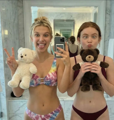 Deepfake of Millie Bobby Brown and Sadie Sink in a bathroom selfie