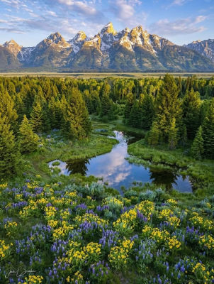 AI-generated mountain landscape with stream and wildflowers