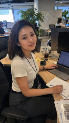 AI-generated image of a woman working at an office desk