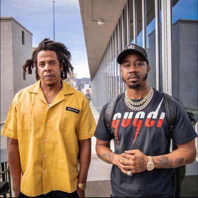AI-generated image of Jay-Z with benny da butcher on a rooftop