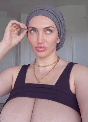 AI-generated selfie of an unidentified woman wearing a head wrap