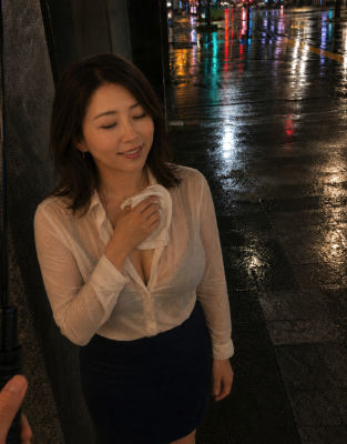 AI-generated image of a woman on a rainy night street
