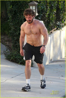 AI-generated image of Shia LaBeouf walking shirtless outdoors