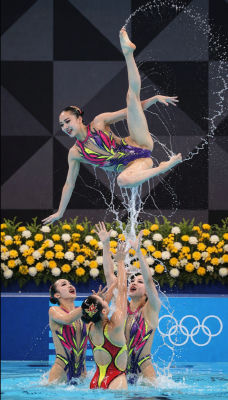 AI-generated image of woman performing artistic swimming at the Olympics