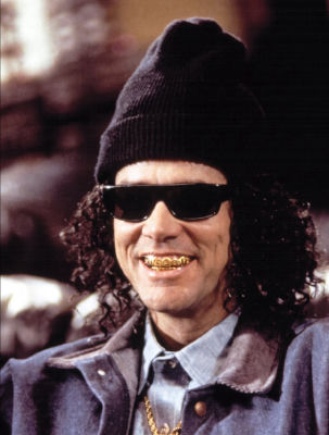 Deepfake of Jim Carrey wearing a black beanie and gold grills