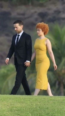 AI-generated image of Tobey Maguire and Ice Spice walking outdoors