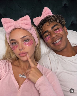 AI-generated image of Lamine Yamal with a woman in matching pink accessories