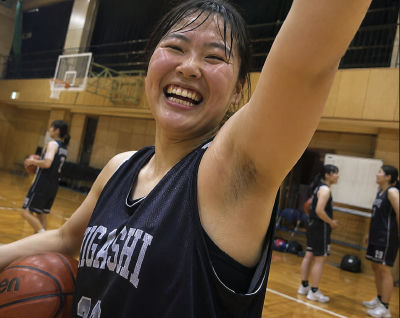 AI-generated image of unidentified woman in a basketball gym
