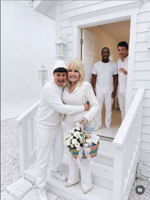 AI-generated image of Dolly Parton and Stephen Jackson in a welcome scene