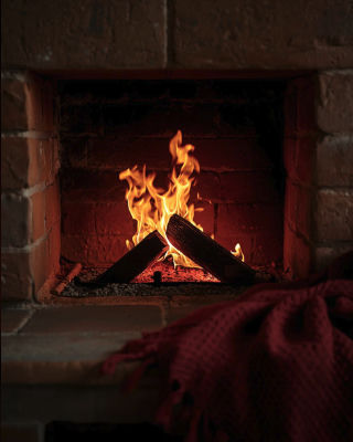 AI-generated image of a brick fireplace with burning logs