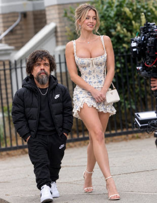 Deepfake of Peter Dinklage and Sydney Sweeney walking on a city street