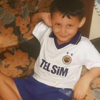 AI-generated childhood photo of Uğurcan Çakır in vintage Fenerbahçe jersey