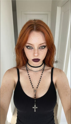 AI-generated image of a woman with religious necklaces