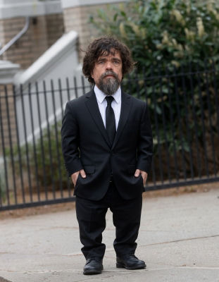 Deepfake image detected of Peter Dinklage standing in a black suit on a city street