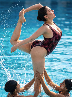 AI-generated image of a synchronized swimming lift in a pool