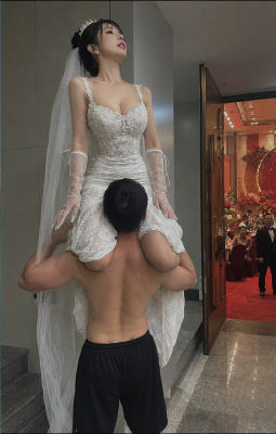 AI-generated image of a man lifting a bride at a wedding