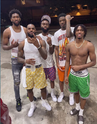 AI-generated image of Joel Embiid, LeBron James, Jaylen Brown, VJ Edgecombe and Tyrese Maxey posing together outdoors