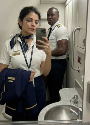 AI-generated airplane lavatory selfie featuring a pilot resembling Cristian Borja