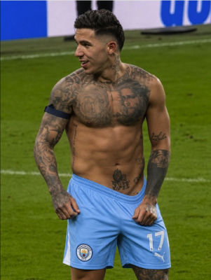 AI-generated image of Adrián Ugarriza in Manchester City shorts on a pitch