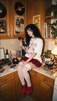 AI-generated image of a woman in a retro-styled kitchen