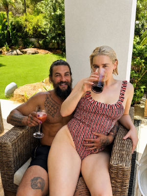 Deepfake image of Jason Momoa and Emilia Clarke relaxing outdoors