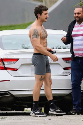 Deepfake image of Shia LaBeouf jogging shirtless past a parked car