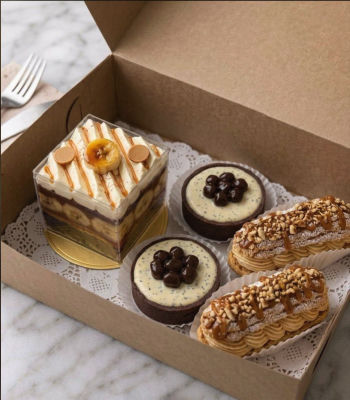 AI-generated image of assorted pastries in a bakery box