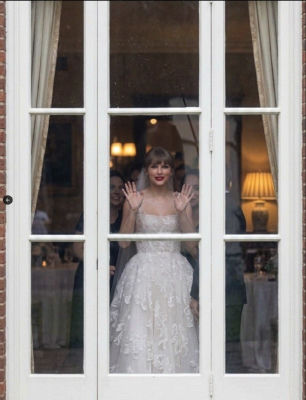 AI-generated image of Taylor Swift in a wedding gown waving from behind French doors