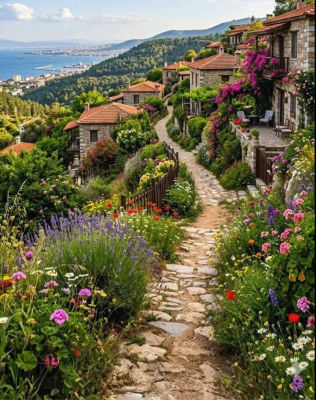 AI-generated image of a Mediterranean hillside village with flower-lined cobblestone path