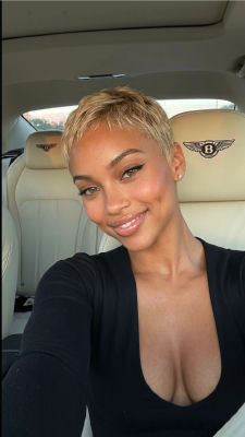 AI-generated image of unidentified woman taking a selfie inside a Bentley
