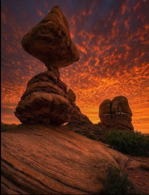AI-generated image of red rock formations at sunset
