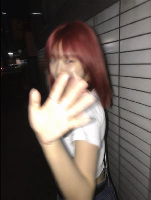 AI-generated image of an unidentified woman with red hair