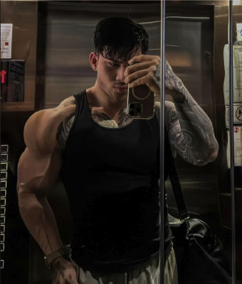 AI-generated image of a muscular, tattooed man in a mirror selfie