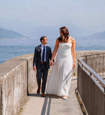 AI-generated wedding photo of Lucas Byrd and Ellie Holzman at a lakeside promenade