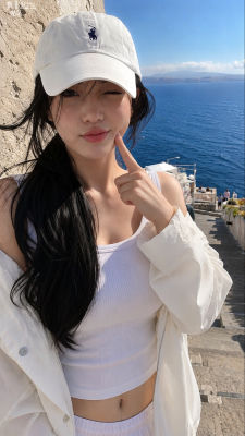 AI-generated selfie of a woman at a coastal viewpoint
