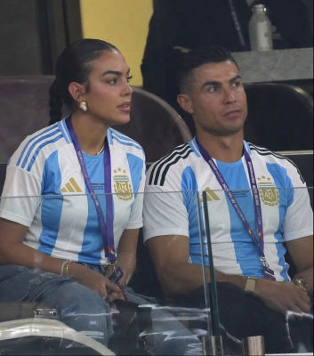 AI-generated image of Cristiano Ronaldo and Georgina Rodríguez in Argentina jerseys at 2022 World Cup