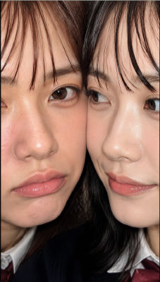 AI-generated portrait of two young women in school uniforms