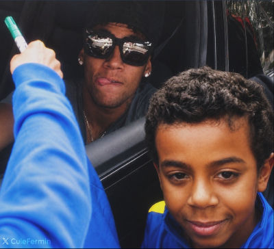 AI-generated image of Neymar signing an autograph for a young fan