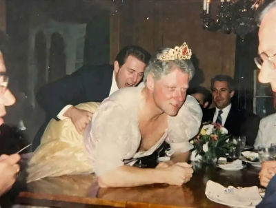 AI-generated image of Bill Clinton in a wedding dress and tiara at a formal dinner