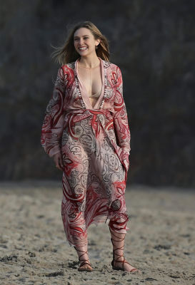 AI-generated image of Elizabeth Olsen on a beach in a paisley dress